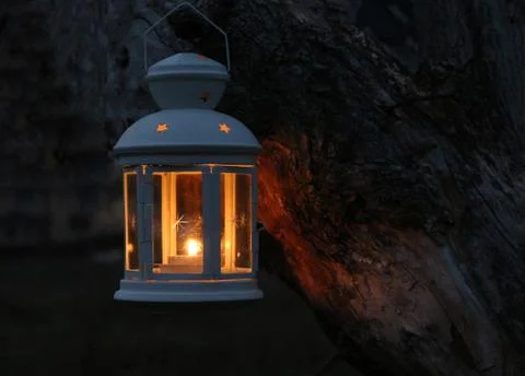 The candle in the candlestick. Stock Photos