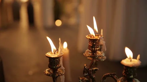 Candle in a candlestick a warm atmosphere, background Stock Footage 68805067