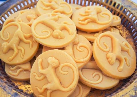 Candle carved monkey Stock Photos