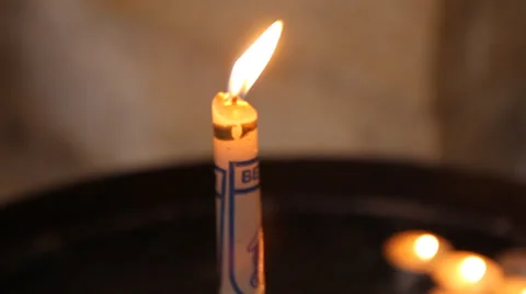 Candle in a church in Jerusalem Stock Footage 32152587