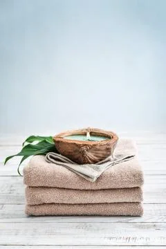 Candle in coconut shell Stock Photos