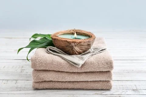 Candle in coconut shell Stock Photos