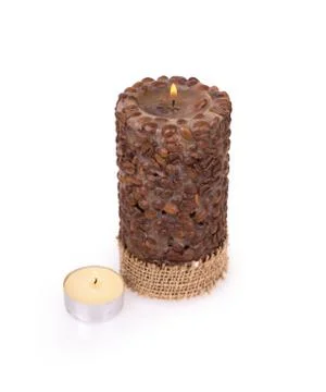 Candle with coffee beans Stock Photos