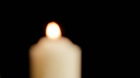 Candle comes into focus Vídeo Stock 12031755