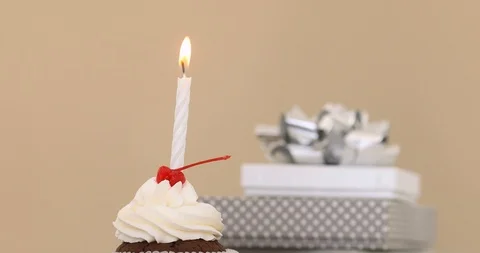 Candle in cupcake pastel background Stock Footage 89255542