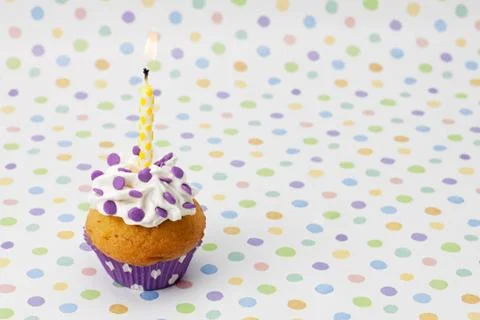 Candle on cupcake Foto stock