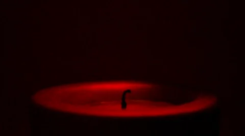 Candle in the dark background Stock Footage 683918