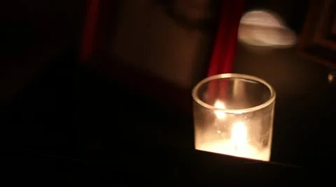 Candle in the dark lighting picture frame Stock Footage 11136056