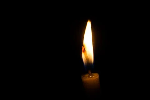 Candle in the dark Stock Photos