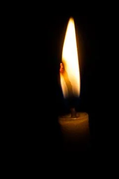 Candle in the dark Stock Photos