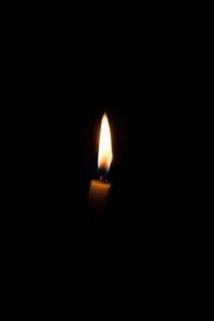 Candle in the dark Foto stock