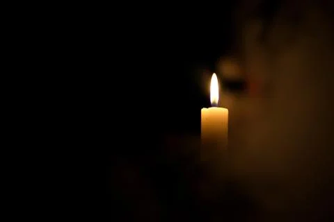 Candle in the dark Stock Photos