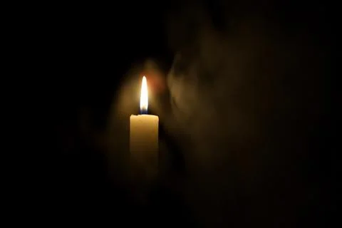 Candle in the dark Stock Photos