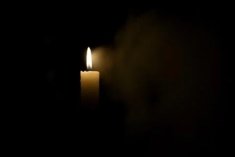 Candle in the dark Stock Photos