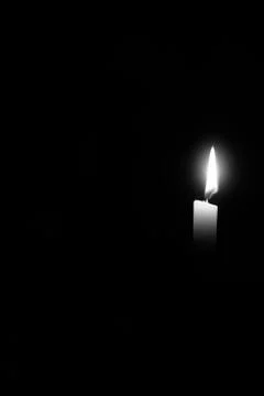 Candle in the dark Stock Photos