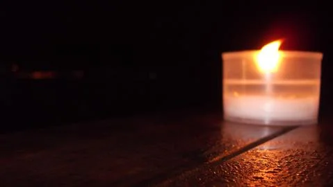 A candle in the dark Foto stock