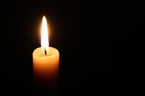 Candle in the dark Stock Photos
