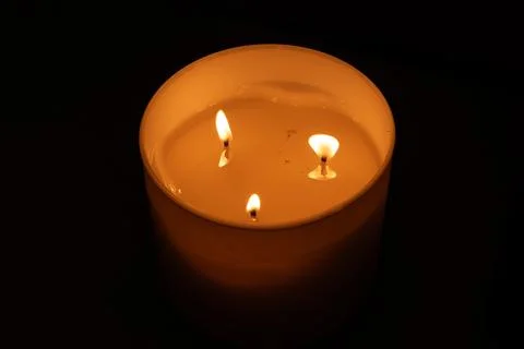 Candle in the dark Stock Photos