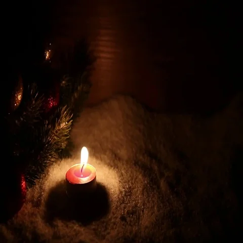Candle in dark at the snow Stock Footage 69654512