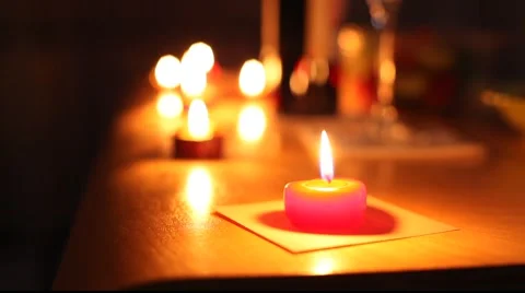 Candle on the dinner table Stock Footage 973672
