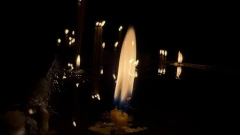 Candle with Dramatic Flame in Darkness Video stock 266848629