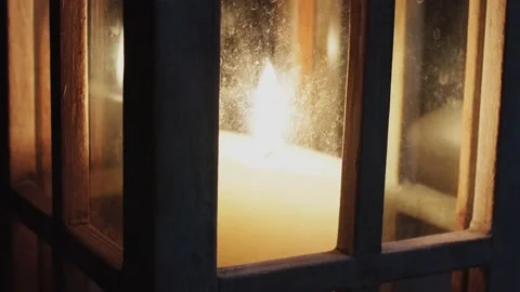 A candle during storm outside 動画素材 164460549