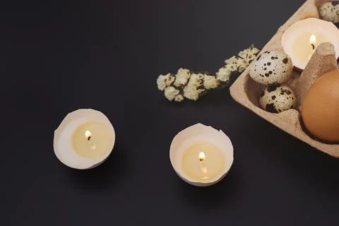 Candle in eggshell Stock Photos