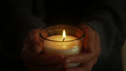 Candle in female hands Video stock 236949150