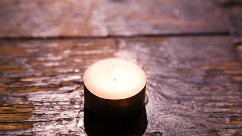 Candle flame being blown out Видео 73932076