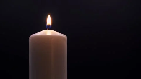 Candle flame burning in darkness Full HD 60fps Video stock 323114648
