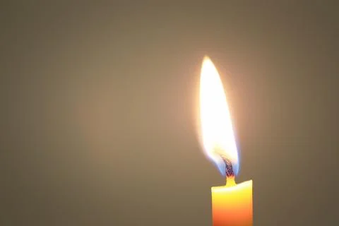 Candle flame burning. Stock Photos