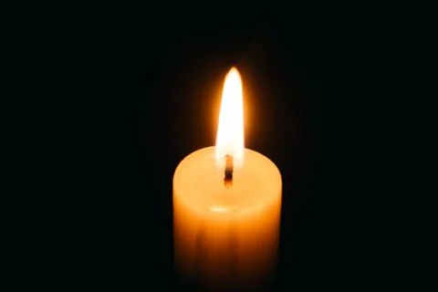 Candle flame close up on a black background Foto stock