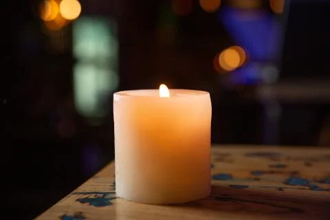 Candle flame close up on a black background Stock Photos