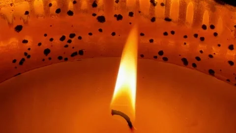 Candle Flame Close Up Burning Wax Light Warm Glow Relaxation Meditation Video Stock Footage 330974663