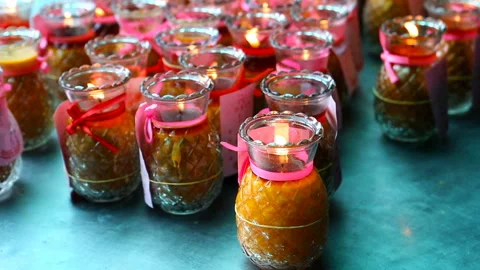 Candle flame close-up in the Chinese Temple on a Religious Festival.  Video stock 90465385