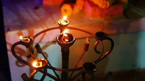 Candle flame close-up in the Indian Temple on a Religious Festival Diwali. .. Stock-Footage 74875594