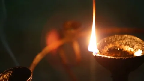 Candle flame close-up in the Indian Temple on a Religious Festival Diwali. .. Stock-Footage 74875707