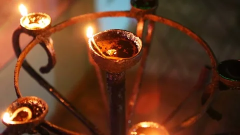 Candle flame close-up in the Indian Temple on a Religious Festival Diwali. .. Stock-Footage 74875744