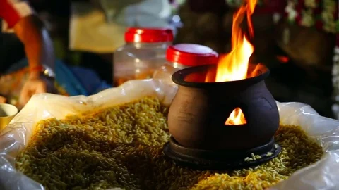 Candle flame close-up in the Indian Temple on a Religious Festival Diwali. Oi Video stock 77717270