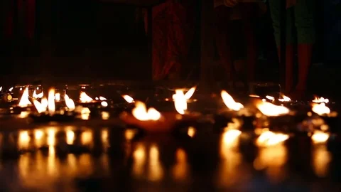 Candle flame close-up in the Indian Temple on a Religious Festival Diwali. Oi Video stock 77717326