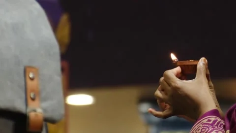 Candle flame close-up in the Indian Temple on a Religious Festival Diwali. Stock Footage 252837770