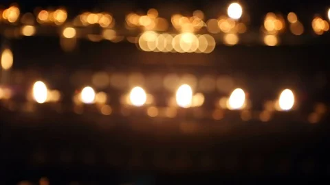 Candle flame close-up. Many Candles in a Buddhist temple. Religious Festival. Stock Footage 88132477