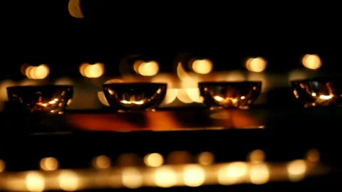 Candle flame close-up. Many Candles in a Buddhist temple. Religious Festival. Stock Footage 88133082