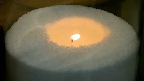 Candle flame closeup burning, power outage, paraffin aka wax, candlelight. Video stock 234463955