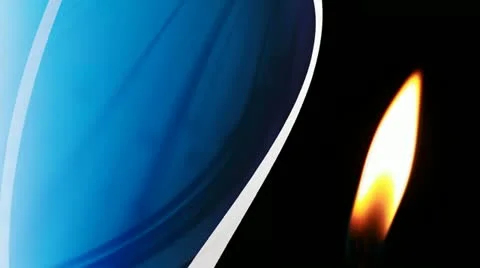 Candle flame closeup with silk background Stock Footage 11320385