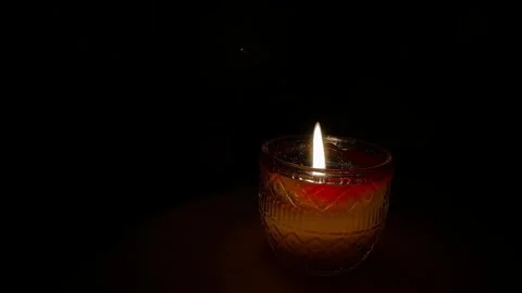 Candle flame in a dark environment Stock Footage 303423411