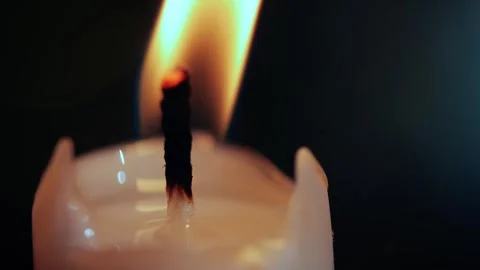 Candle flame flickering macro Stock Footage 257448177
