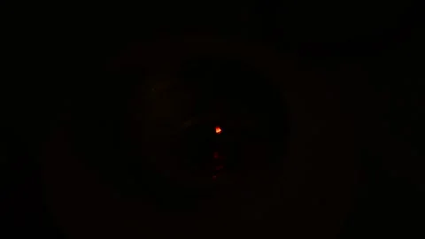 Candle flame going out in darkness, the last glowing ember fading on the wick of Stock Footage 347446413