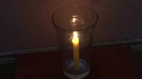 Candle flame : How long a candle can survive into a closed glass? Stock-Footage 41698436