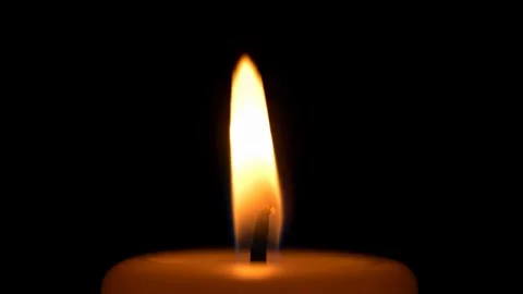 Candle flame isolated on black background. Stock Footage 330124986